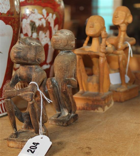 Tribal Art: Indonesia? A pair of male and female carved figures,